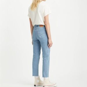 Levi’s 724 High Rise Slim Straight Raw Hem Jeans